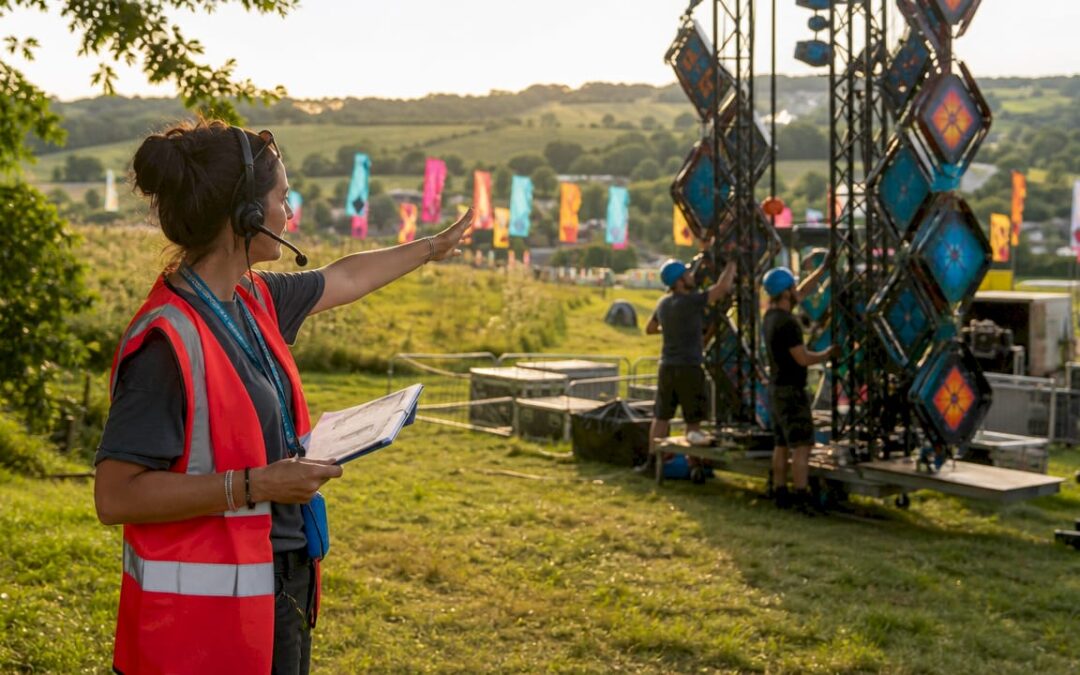 Event planner inspecting outdoor party setup
