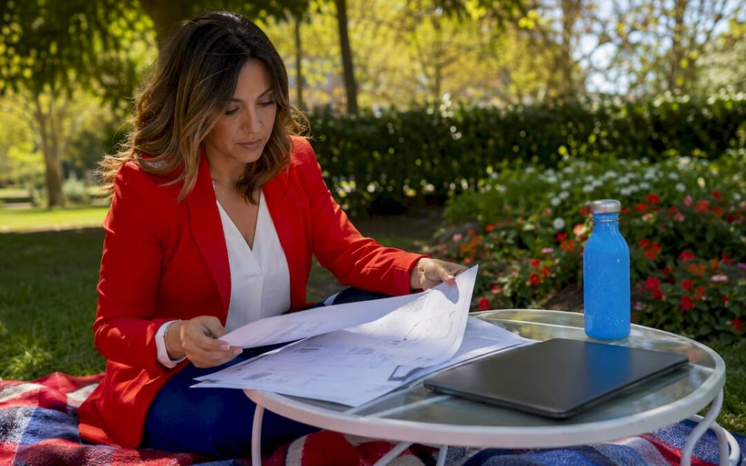 Event planner reviewing outdoor power plan documents