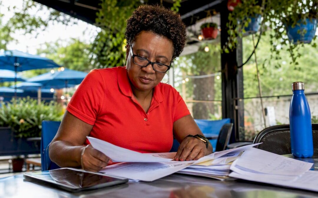 Event manager reviewing generator hire contracts