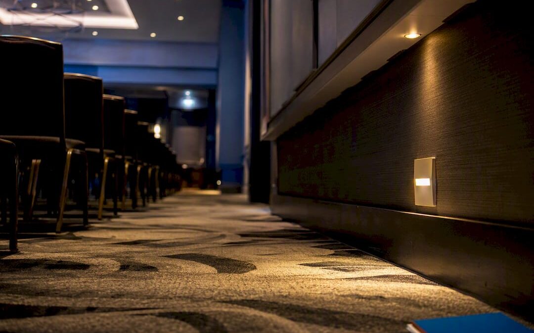 Emergency lighting guiding a venue escape route
