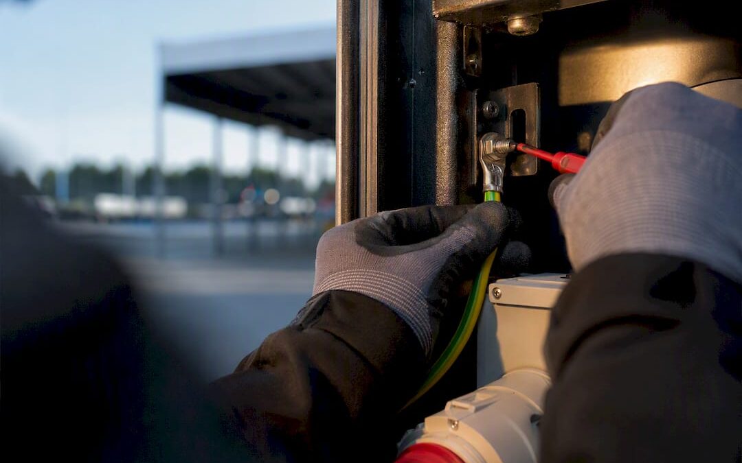 Electrician checking temporary earth termination